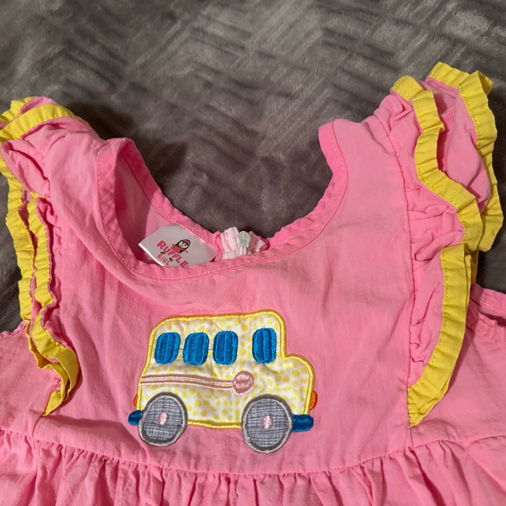 Pink Dress with Yellow Ruffle and Bus Design